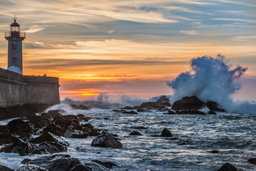 Canvas Print - Sunset over Atlantic Ocean seen from beach in Foz do Douro parish in Porto city, Portugal