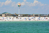 Fototapeta  - Beach goers at Pensacola Beach in Escambia County, Florida on the Gulf of Mexico, USA