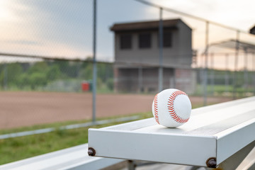 Wall Mural -  baseball on bleachers at a baseball field 