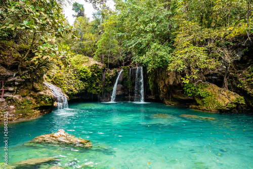 Fotomural Kawasan Falls on Cebu island in Philippines, turquoise waterfalls