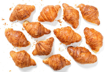 Freshly baked croissants  isolated on white background .