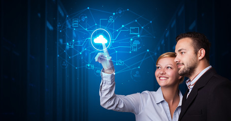 Poster - Man and woman touching hologram projection displaying cloud system 

