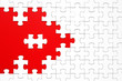 © Alexander - White puzzle pieces on a red background separated