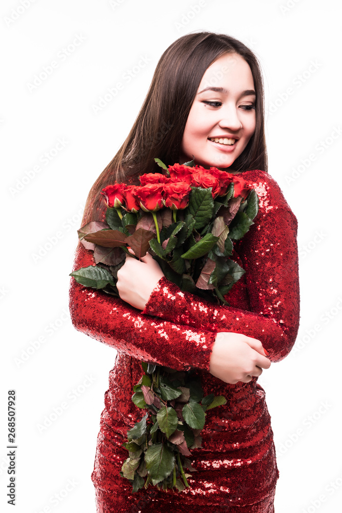 Portrait of an attractive young asian woman dressed in red dress ...