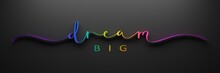 DREAM BIG 3D Render Of Brush Calligraphy With Rainbow Gradient On Black Background