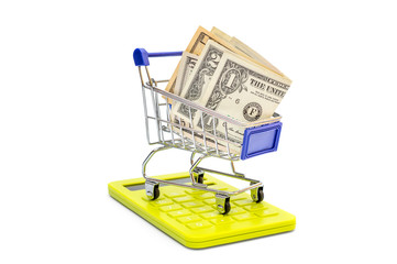 Wall Mural - Shopping cart with money and calculator on white.