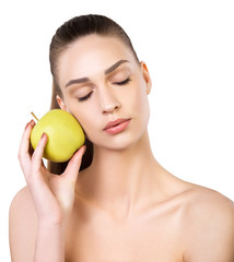 Beautiful young woman with health fresh skin and apple