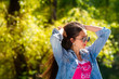 © ako-photography - Outdoor portrait of beautiful, emotional, young woman in sunglasses. Soft background. Copy space.