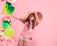 Little Cute Girl In Summer Hat On Color Background