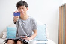 Asian Teens Are Happy With Shopping With Credit Cards.