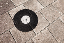 Geodetic Survey Marker Set In A Pavement.
