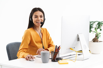 Sticker - Portrait of european hotline assistant woman wearing microphone headset speaking with customer by phone in office