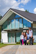 © alotofpeople - Happy family and their house