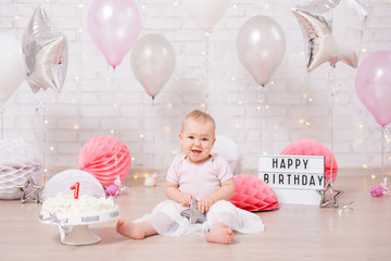 Wall Mural - first birthday concept - cute baby girl and smashed birthday cake with lights, stars and balloons