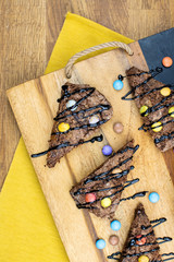 Wall Mural - Chocolate scones with colorful candies