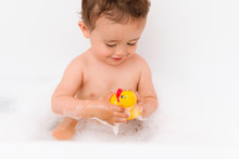 Baby Boy In Bubble Bath With Rubber Duck