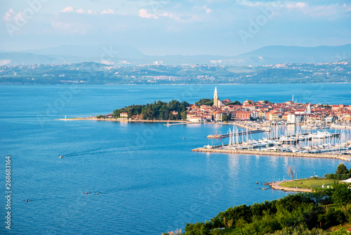 Beautiful amazing city scenery with boats in the bay in Izola, Slovenia. Wond...