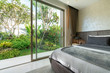 © Stock PK - interior design in bedroom of pool villa with cozy king bed