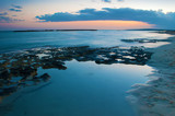 Fototapeta Niebo - View of empty sandy Poseidon Beach