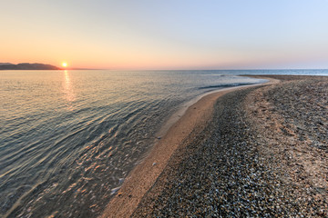 Wall Mural - sunrise in Possidi Cape beach, Greece