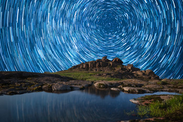 Wall Mural - night landscape with stars above mountains