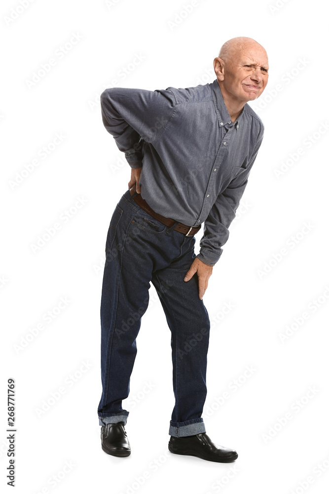 Senior man suffering from back pain on white background
