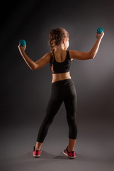 girl with dumbbells