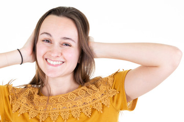 Wall Mural - Excited happy young woman feeling overjoyed isolated at white background