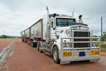 Road Train Used For Long Freight Transport In Australia. Called Road Train For How Long They Are. Can Measure More Than 50 Meters Long Super Long White Goods Truck With Three Containers.