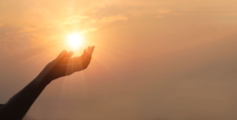 Canvas Afdrukken
 - Woman hands praying for blessing from god on sunset background