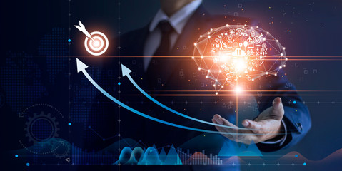Poster - Businessman holding abstract brain and icon digital marketing, strategy and growtn investment business target goal, media and technology.