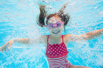 Children swim in  pool