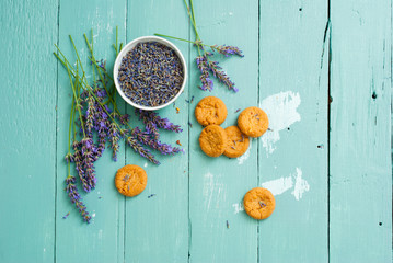 Wall Mural - cakes with lavender on aged blue wood table