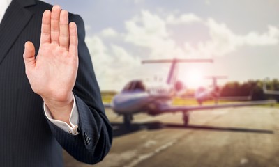 Wall Mural - Businessman gesture with his hands on background