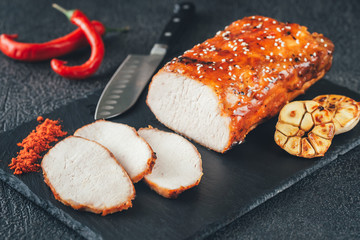 Sticker - Baked meat with paprika on the black sone board