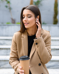 Sticker - Beautiful young woman wearing autumn coat