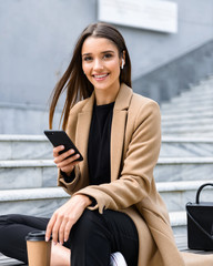 Sticker - Beautiful young woman wearing autumn coat