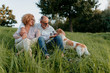 © Brat Co./Stocksy - Stylish Senior couple with their dog