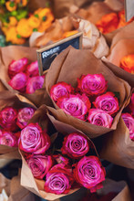 Pretty Pink And Red Roses For Sale In A Market Stall