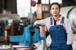 © Jetta Productions/Stocksy - Portrait of a female factory worker