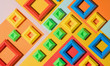 © Audrey Shtecinjo/Stocksy - Colorful squares randomly placed on multicolored base