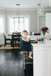 © Alison Winterroth Photography/Stocksy - A Boy Looks Away As her Mother Steals His Lunch
