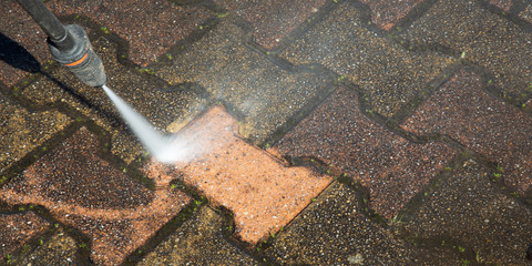 Outdoor floor cleaning with a pressure water jet in banner panorama web template