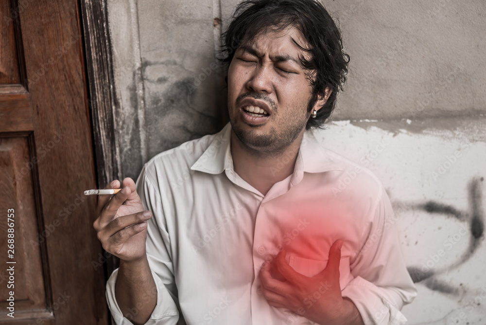 man smoking cigarette stressed Foto Asian Stress man smoking,Thailand people,No tobacco day concept,DIe  from smoke smoking cigarette do Stock