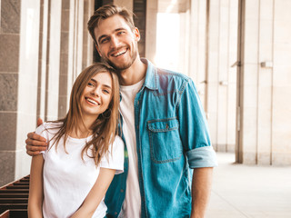 portrait of smiling beautiful girl and her handsome boyfriend. woman in casual summer jeans clothes.