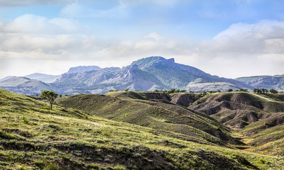 Canvas Print - Landscape with dirt road and mountains