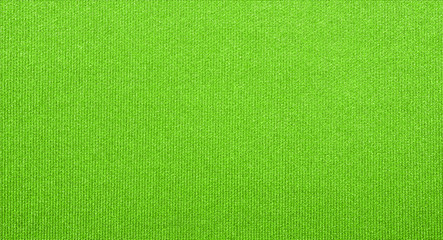 Wall Mural - Dense light green fabric texture.Background of bright green fabric.