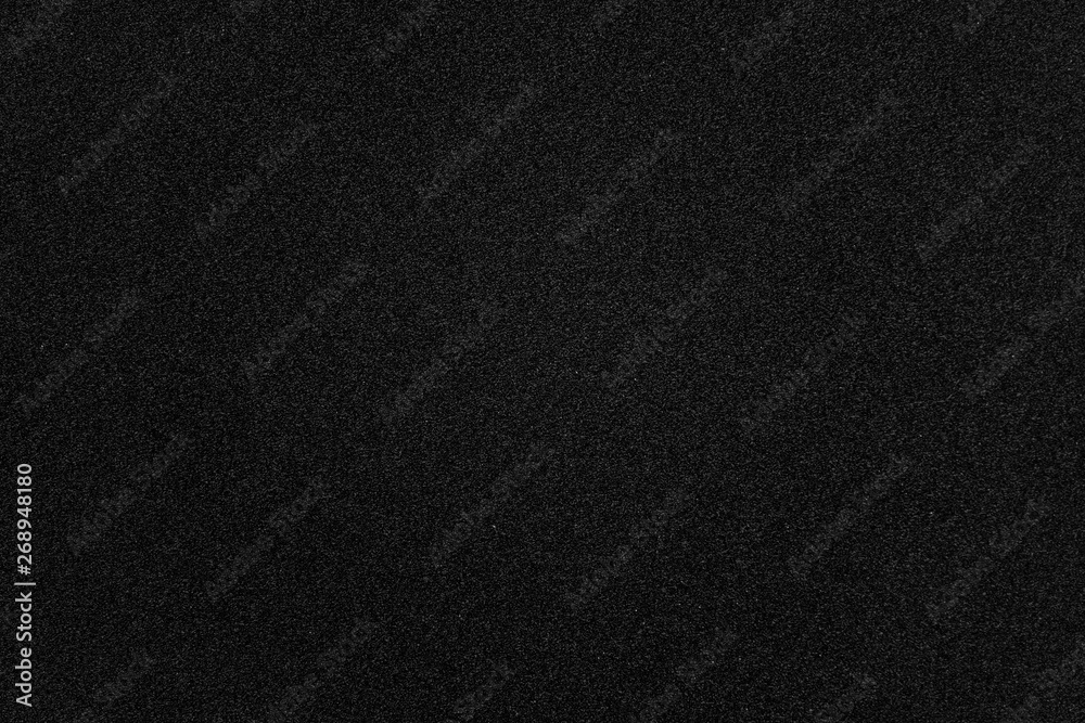 Abstract black grainy paper texture background or backdrop. Empty ...