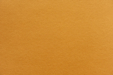 Wall Mural - abstract yellow glossy paper texture background or backdrop. empty wrapping paper or shiny paperboar