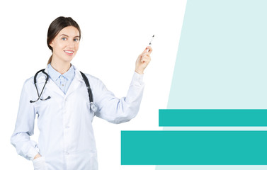 Canvas Print - Smiling female doctor in white coat with stethoscope and clipboard pointing finger